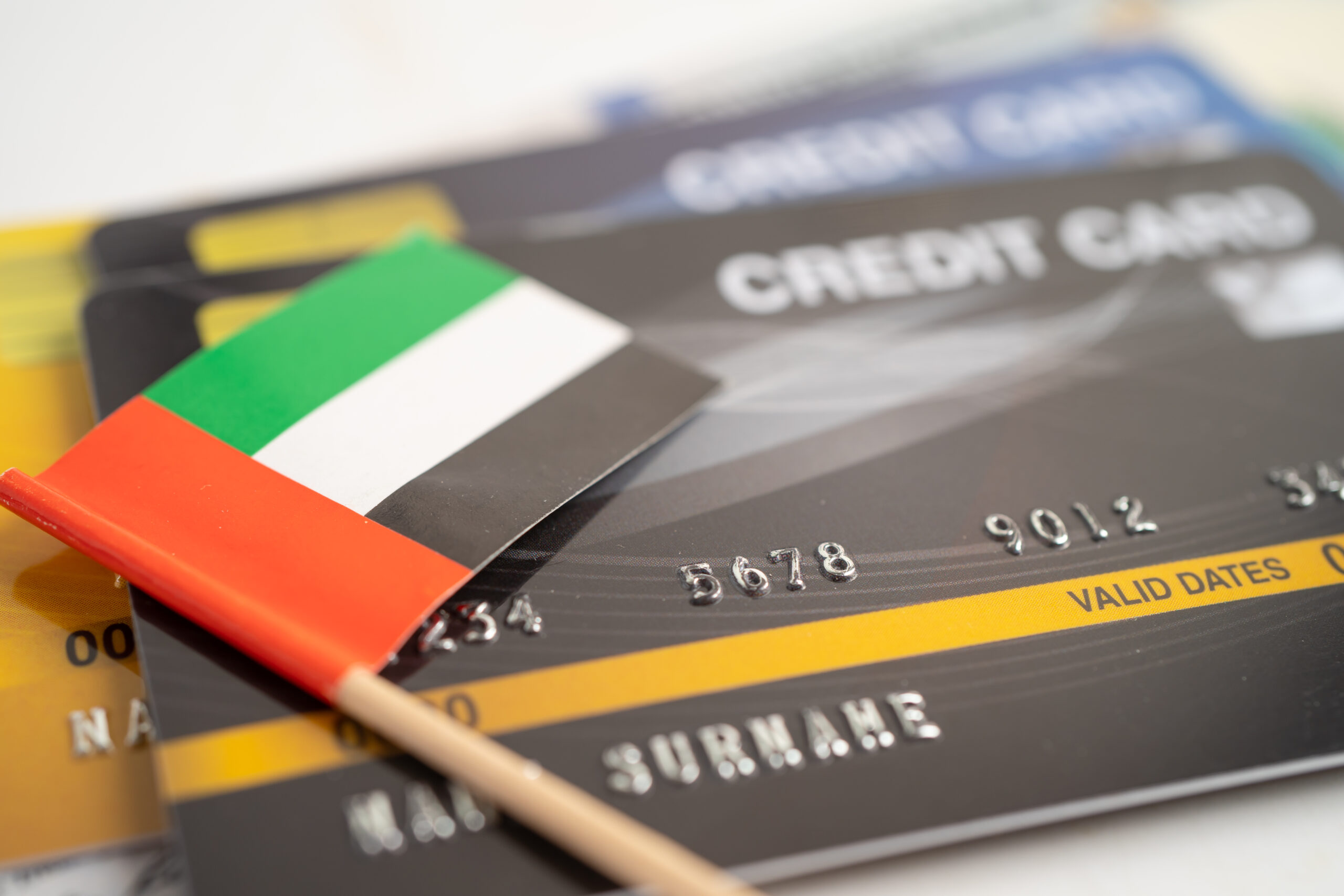 united arab emirates flag on credit card. Finance development, B united arab emirates flag on credit card. Finance development, Banking Account, Statistics, Investment Analytic research data economy, Stock exchange trading, Business company concept.